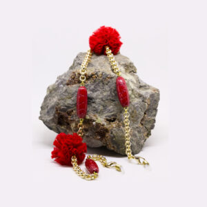 Lunari oro con pompom rosso